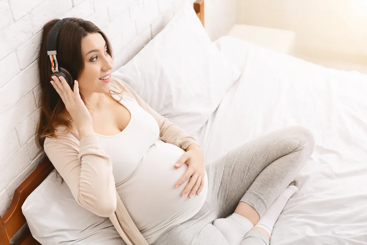 How can I practice prenatal stimulation at home?