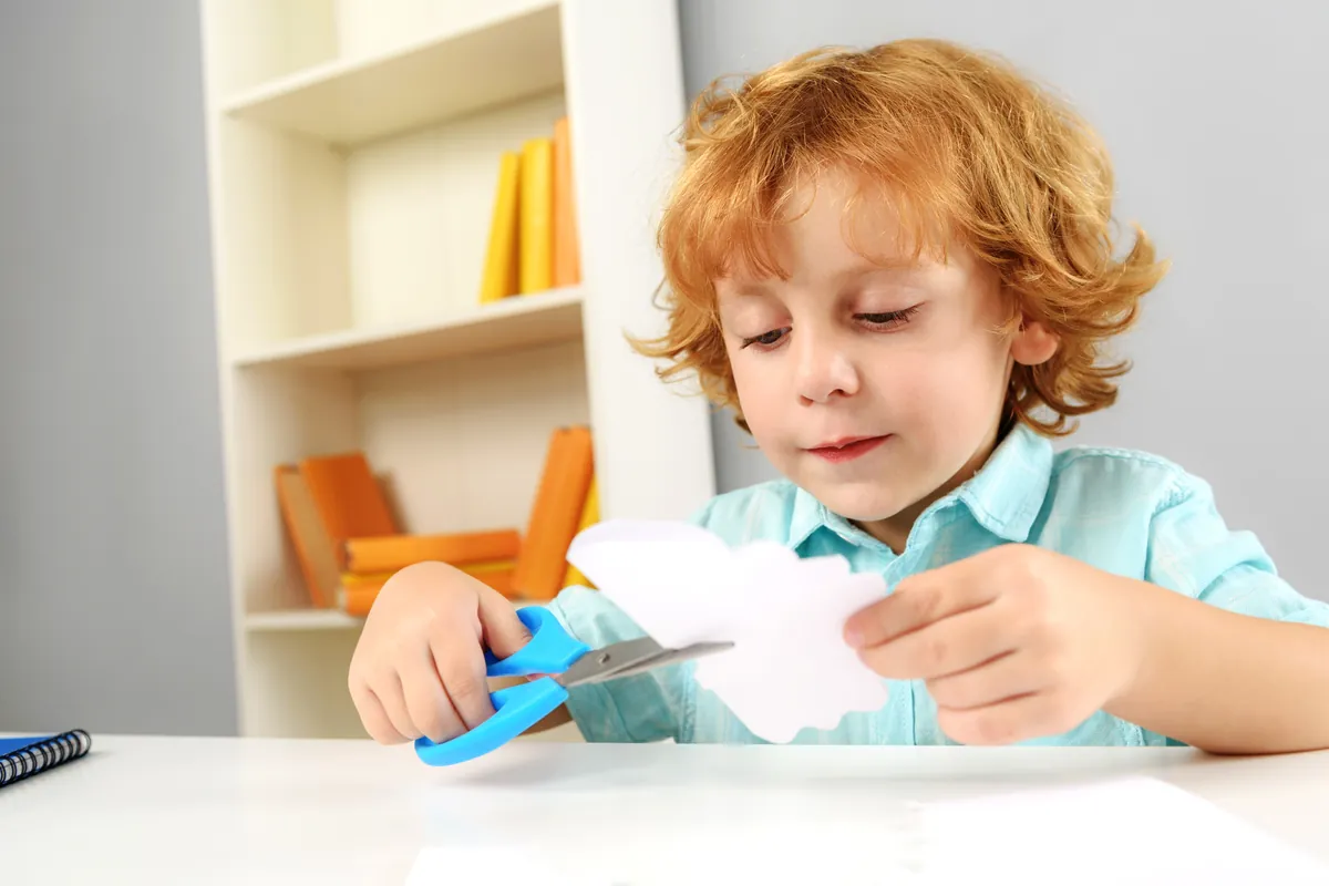How to foster fine motor skills using scissors?