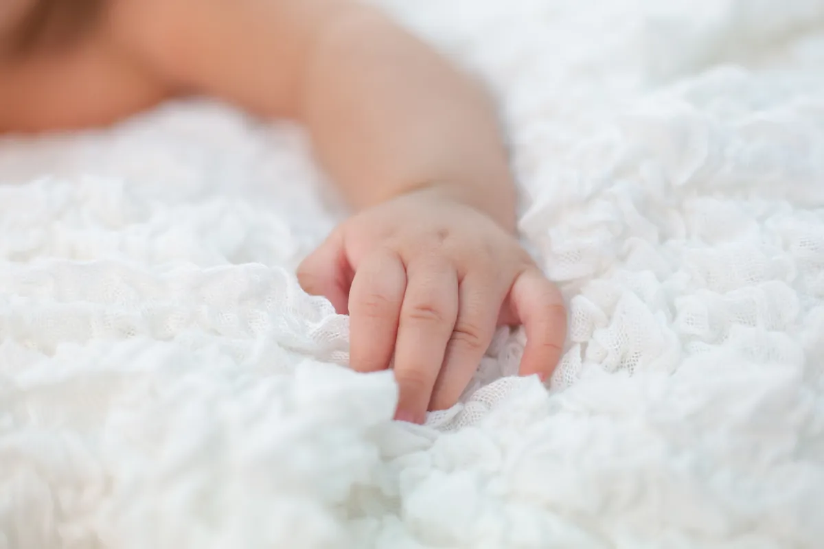 How can I stimulate my baby’s sense of touch?