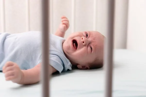 Why does my newborn baby wake up at night and sleep during the day?