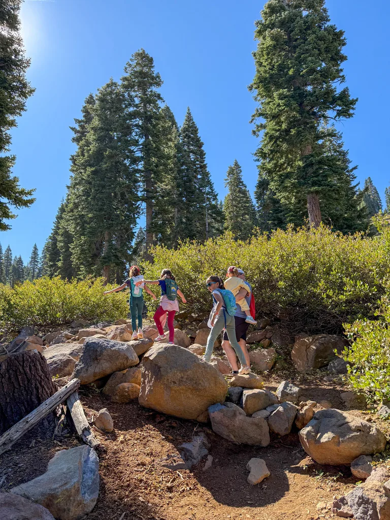 Luis hiking with his daughters